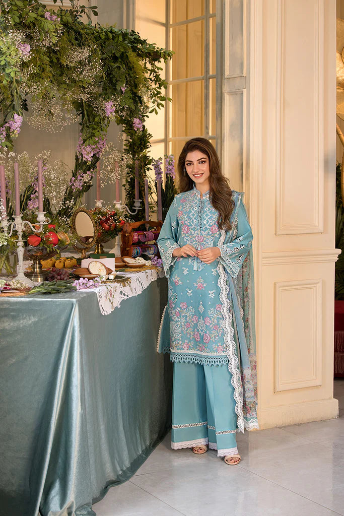 Model wearing teal blue embroidered dress from Sobia Nazir Vital 2025 Design 3A. Pakistani luxury pret and Pakistani clothes online in UK.