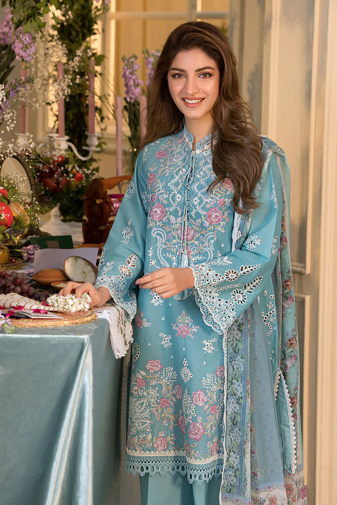 Model wearing teal blue embroidered dress from Sobia Nazir Vital 2025 Design 3A. Pakistani luxury pret and Pakistani clothes online in UK.