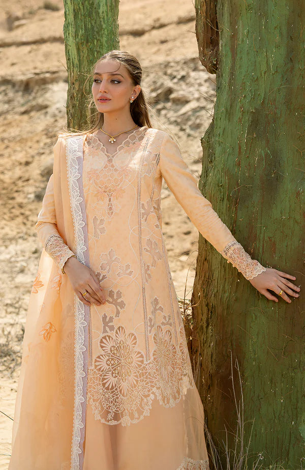 Model wearing peach embroidered dress with matching dupatta from Soraya Noa Summer Casual Pret 2025 Fresco. Pakistani luxury pret UK.