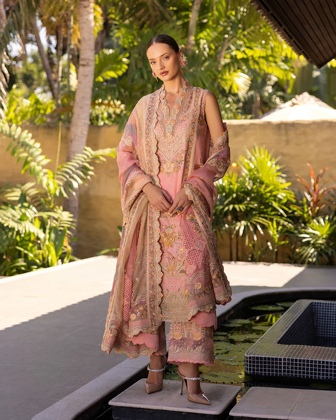 Model wearing peach and gold Peony dress from Faiza Saqlain Zinnia collection, Pakistani Luxury pret, Pakistani clothes online in UK.