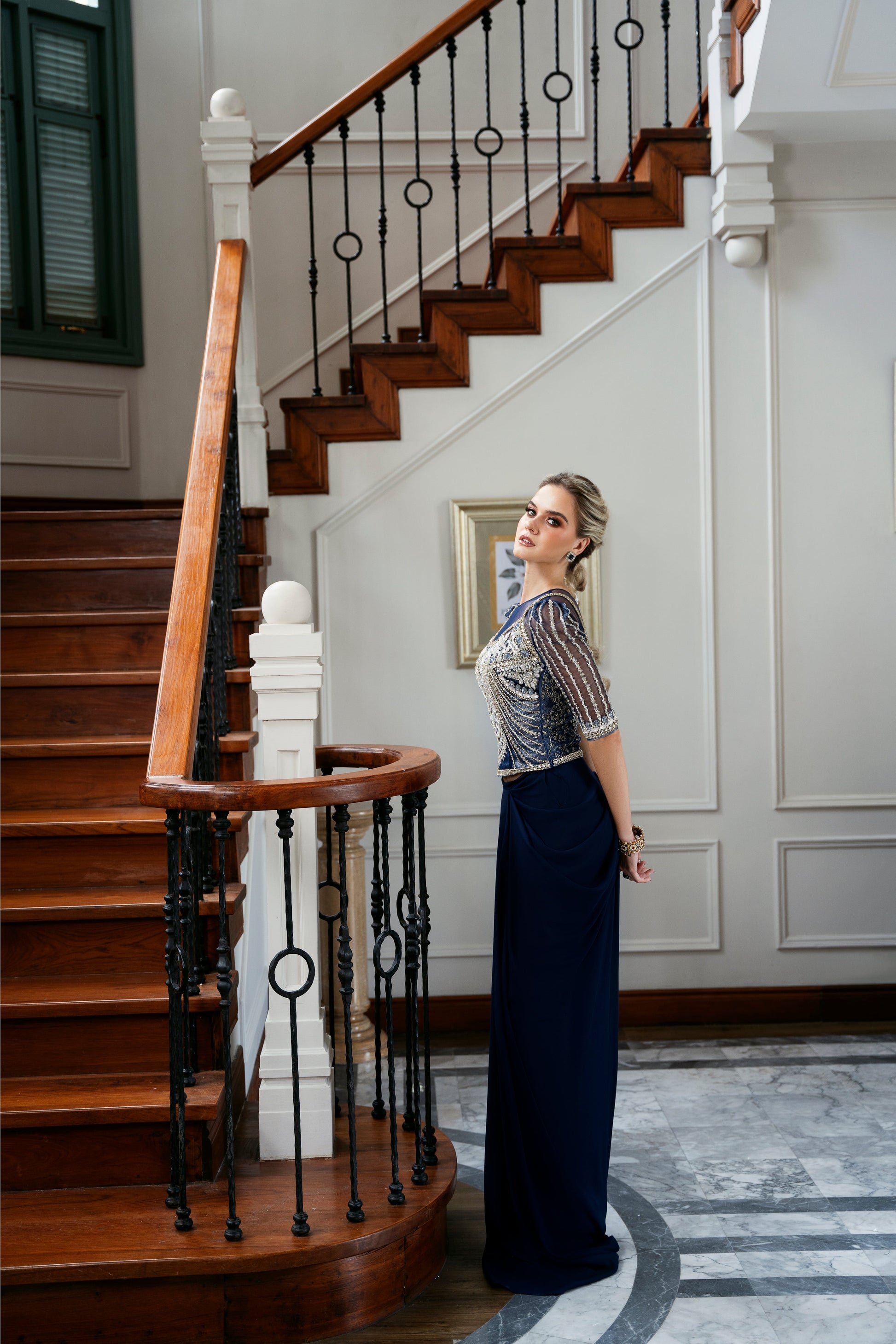 Model wearing Bluebell from Mysie by Tahira, a luxurious navy blue outfit with intricate beaded details, perfect for Pakistani luxury pret in the UK.