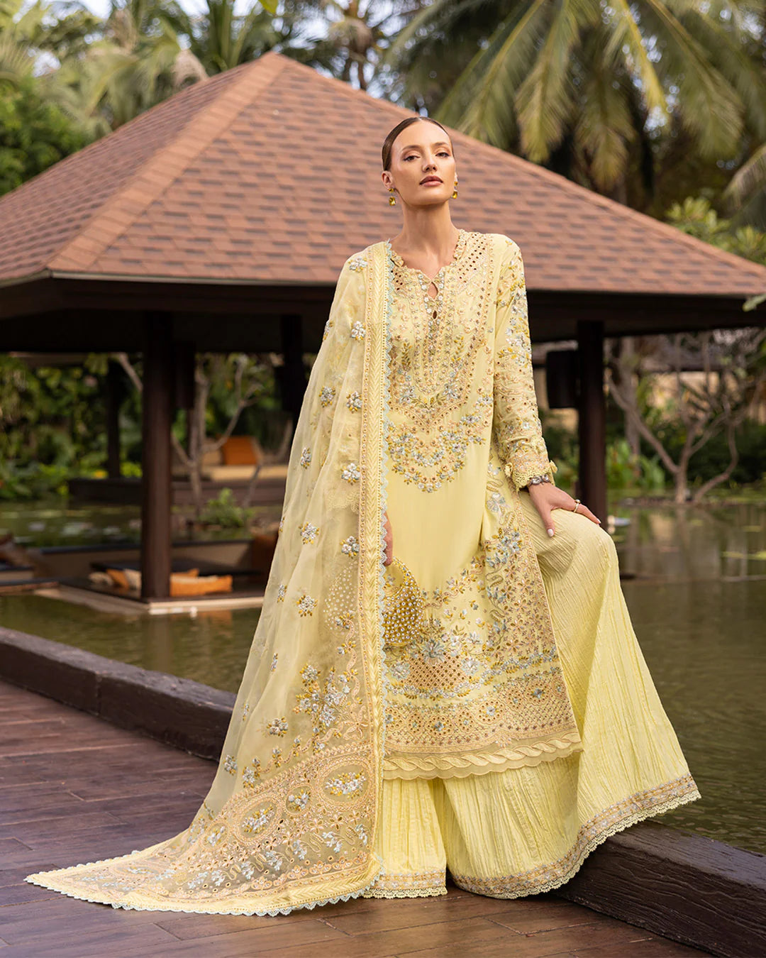 Model wearing pastel yellow Azalea dress from Faiza Saqlain Zinnia collection, Pakistani Luxury pret, Faiza Saqlain Pakistani clothes online in UK.