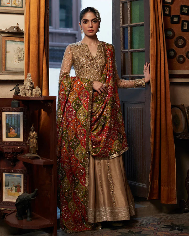 Model wearing beige and multicolor dress Sulata by Faiza Saqlain, Pakistani luxury pret, available online in UK