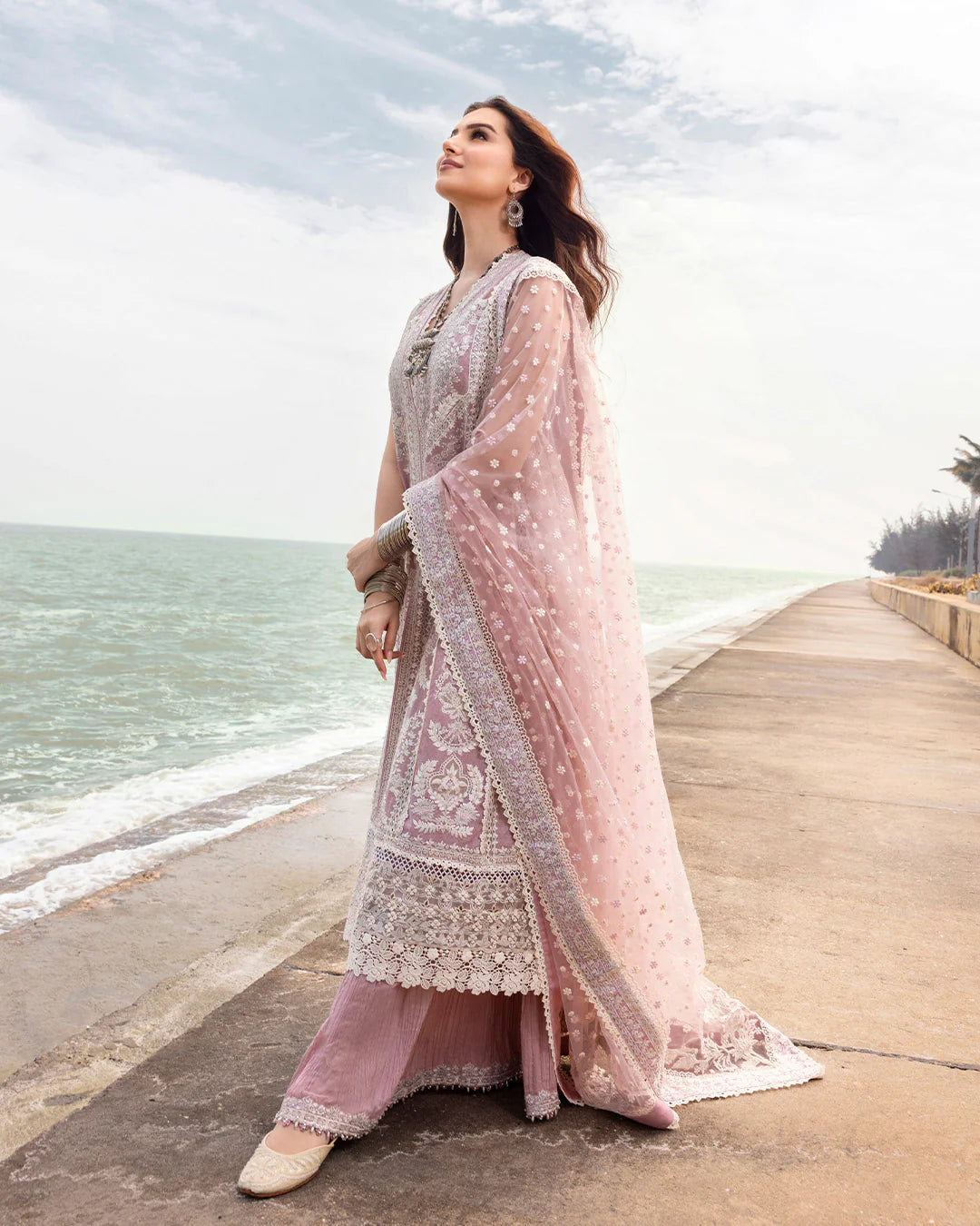 Model wearing blush pink Amaryllis dress from Faiza Saqlain Zinnia collection, Pakistani Luxury pret, Faiza Saqlain Pakistani clothes online in UK.