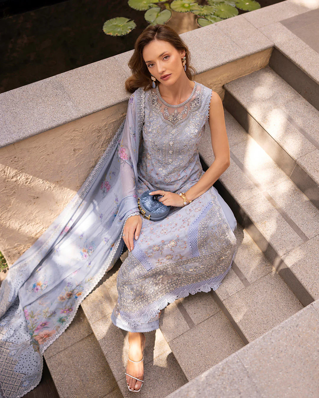 Model wearing pastel blue Liana dress from Faiza Saqlain Zinnia collection, Pakistani Luxury pret, Faiza Saqlain Pakistani clothes online in UK.