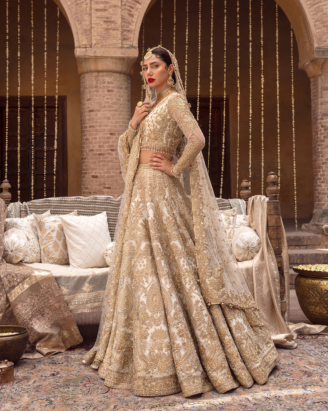 Model wearing cream and gold bridal dress Gelin by Faiza Saqlain, Pakistani luxury pret online in UK for wedding events.