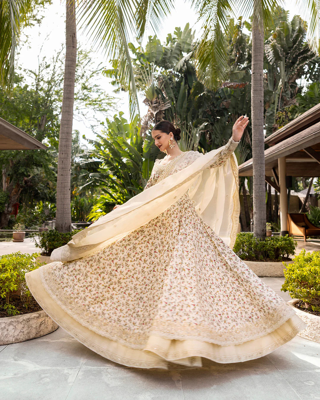 Model wearing cream floral Vinika dress from Faiza Saqlain Zinnia collection, Pakistani Luxury pret, Pakistani clothes online in UK.