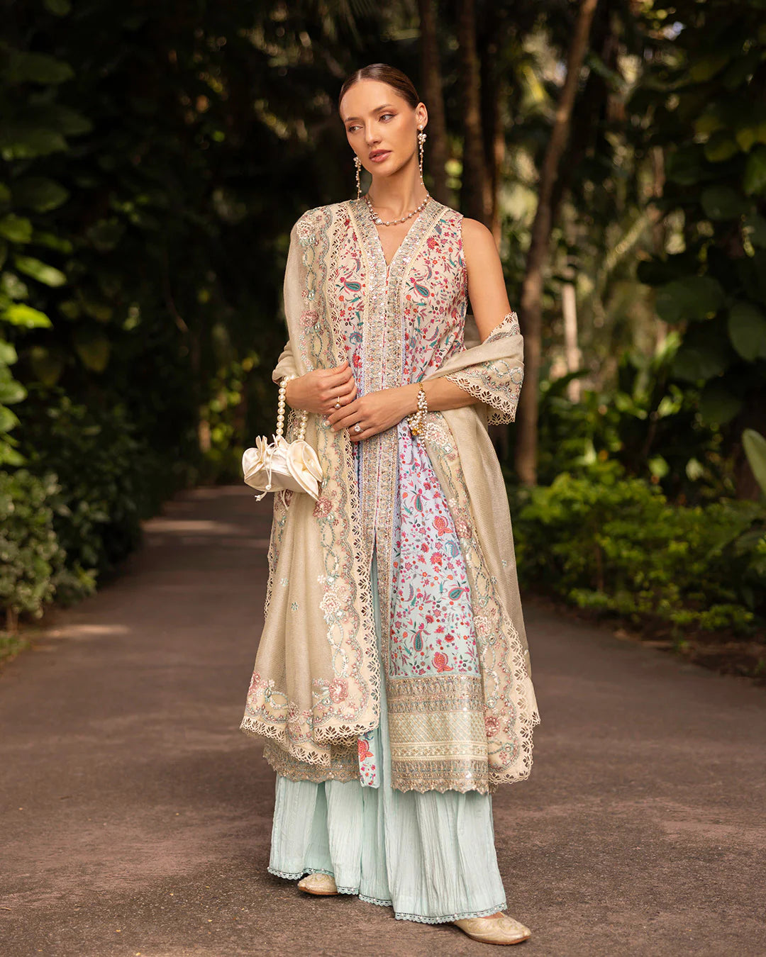 Model wearing multicolored Danica dress with mint trousers from Faiza Saqlain Zinnia collection, Pakistani Luxury pret, Pakistani clothes online in UK.