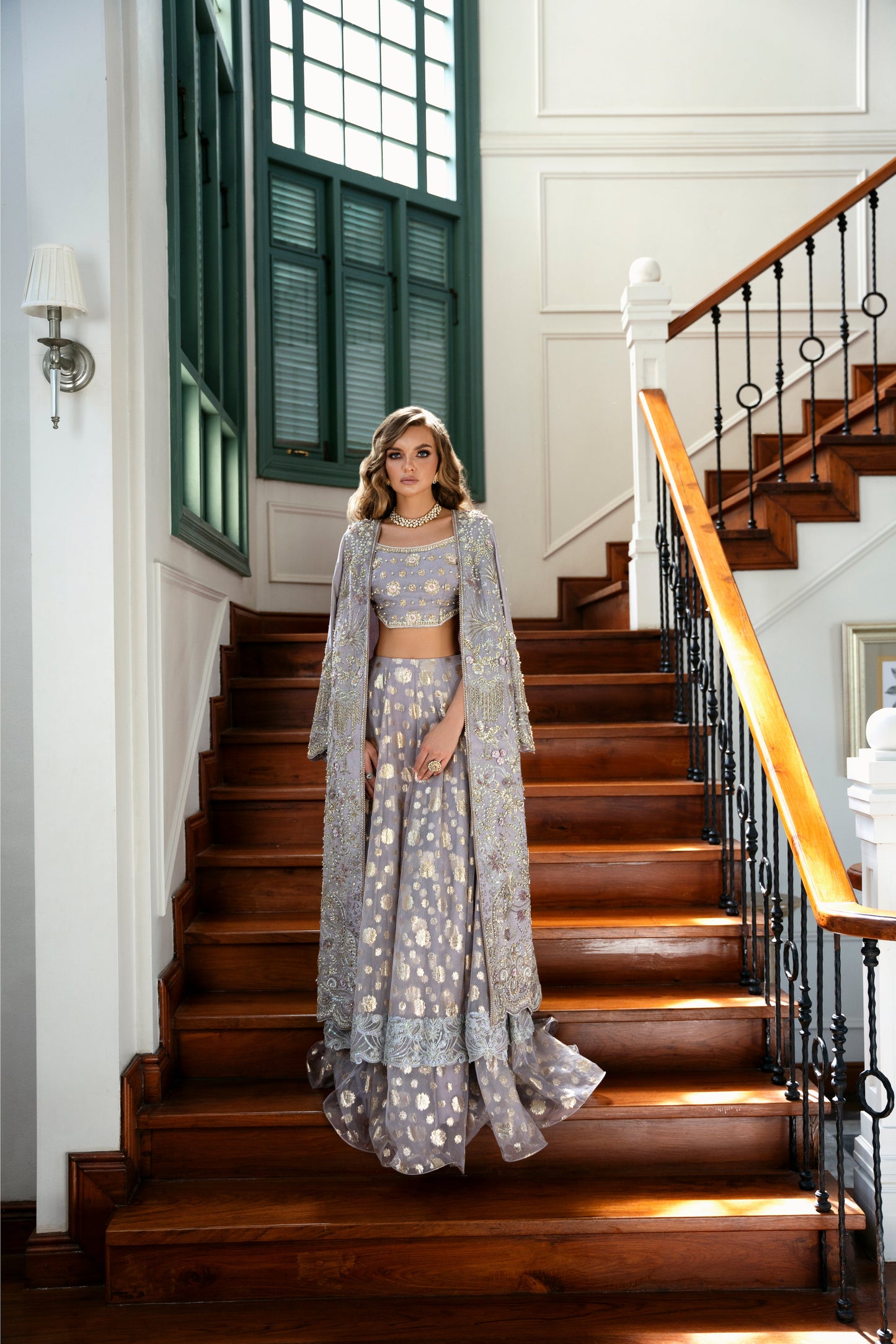 Model wearing Lotus from Mysie by Tahira, a luxurious grey embellished lehenga choli perfect for Pakistani luxury pret in the UK.