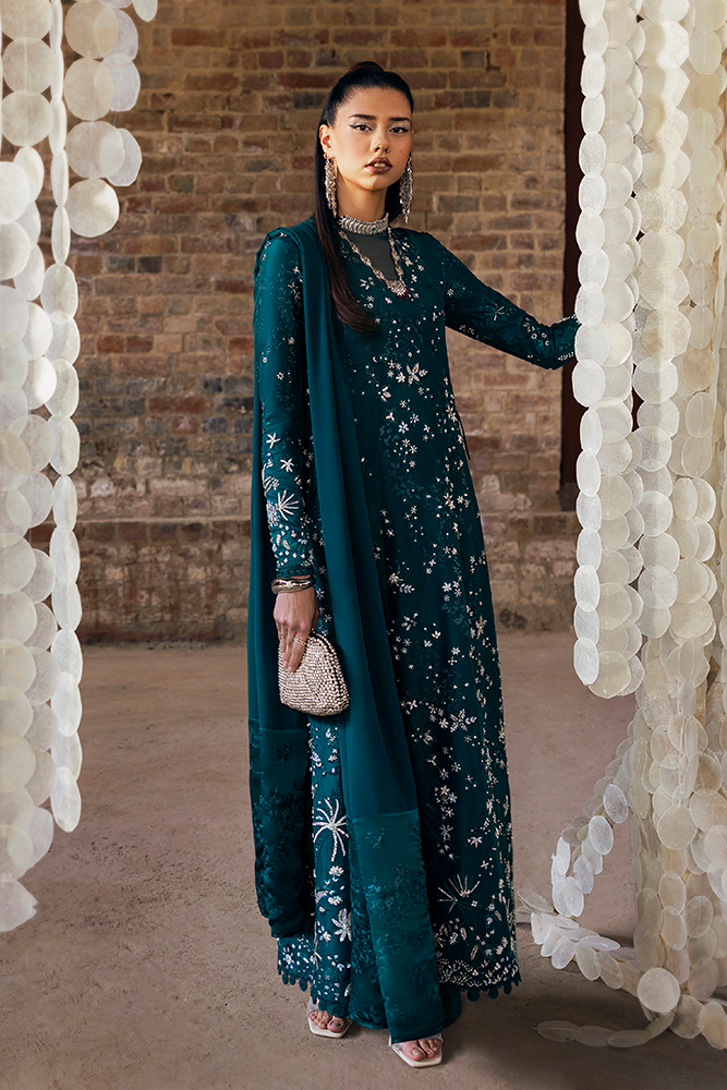 Model wearing SOLARA, back view, a Pakistani designer outfit by Suffuse, available online in the UK.