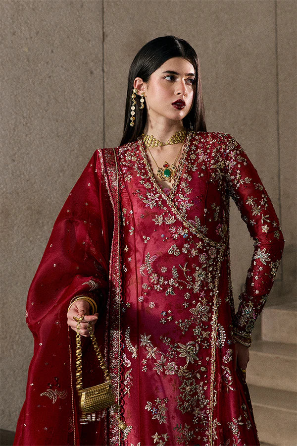 Model wearing wine red embellished ensemble from Suffuse Jaseria, Pakistani luxury pret, shop Pakistani clothes online in UK