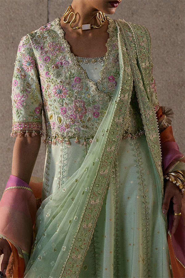 Model wearing pastel green embellished ensemble from Suffuse Aymara, Pakistani luxury pret, shop Pakistani clothes online in UK