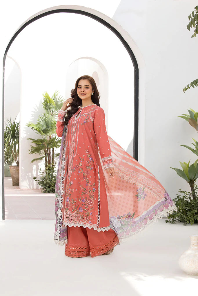 Model wearing Sobia Nazir Vital 2025 Design 4A in coral pink with intricate embroidery. Shop Pakistani luxury pret and Pakistani clothes online in UK.