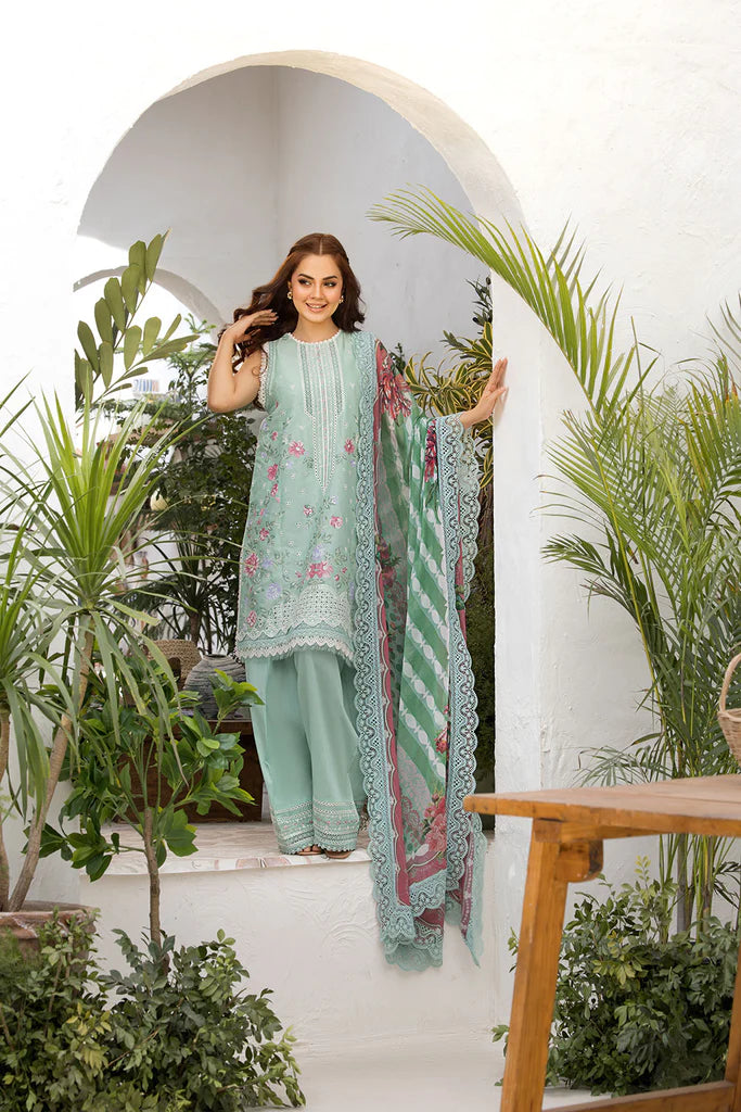Model wearing Sobia Nazir Vital 2025 Design 4B in pastel mint with floral embroidery and lace detailing. Shop Pakistani luxury pret and Pakistani clothes online in UK.