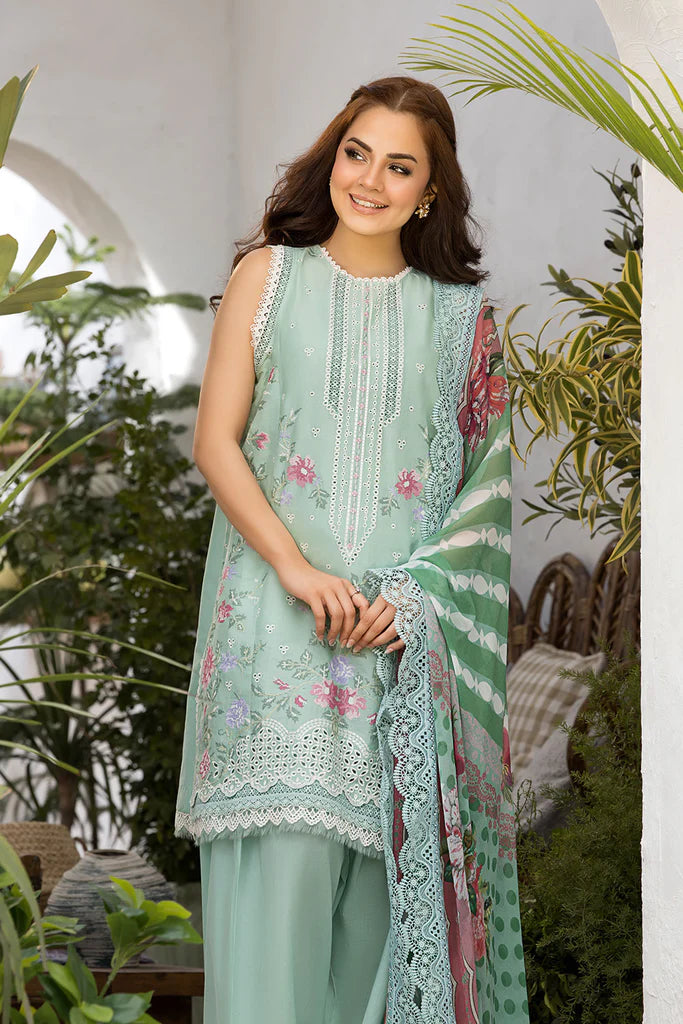 Model wearing Sobia Nazir Vital 2025 Design 4B in pastel mint with floral embroidery and lace detailing. Shop Pakistani luxury pret and Pakistani clothes online in UK.