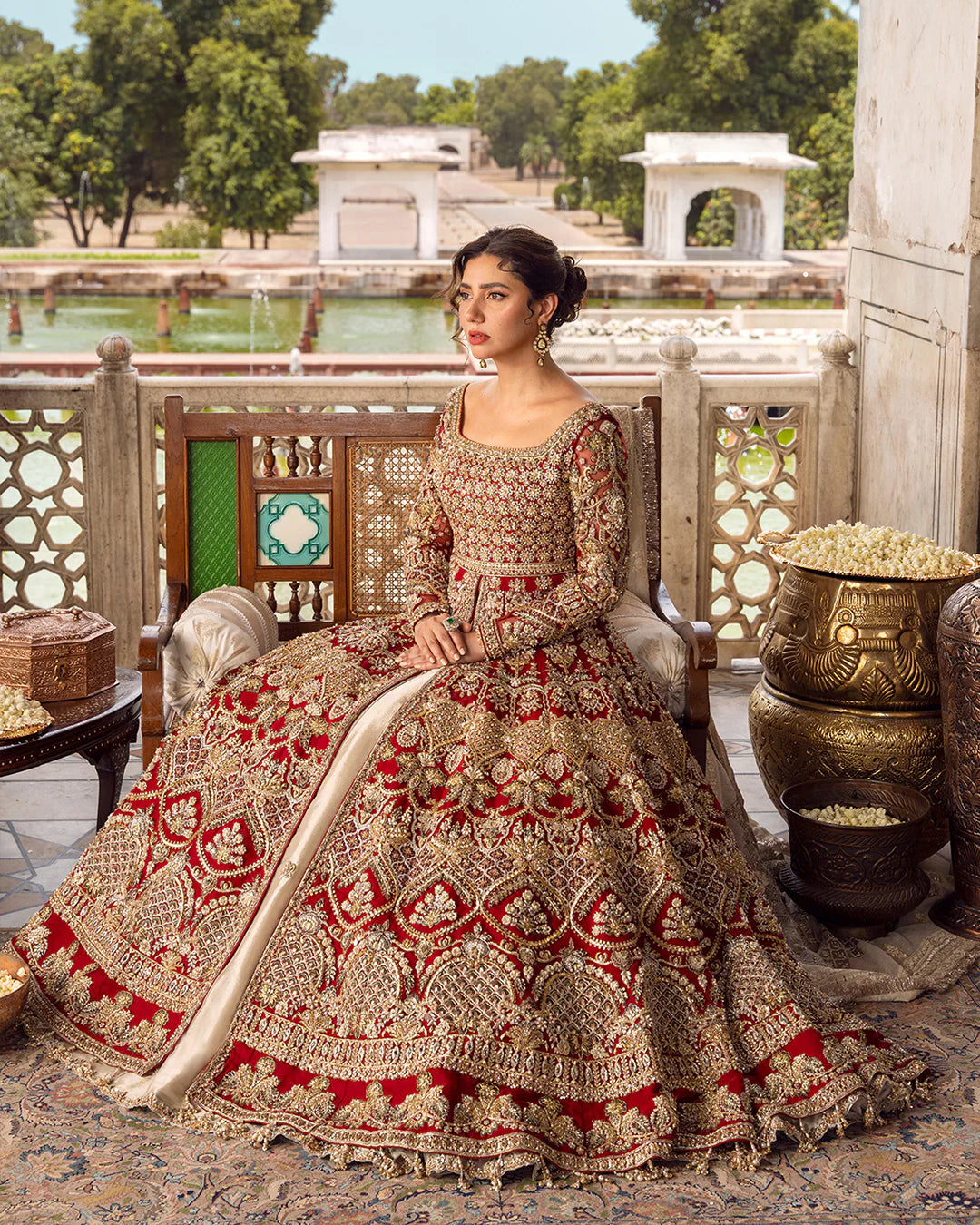 Model wearing deep red and gold bridal dress Juri by Faiza Saqlain, Pakistani luxury pret online in UK for weddings.