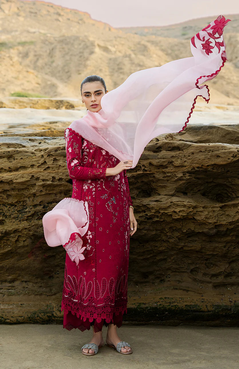 Model wearing deep red embroidered dress with pink dupatta from Soraya Noa Summer Casual Pret 2025 Carmine. Pakistani luxury pret in UK.