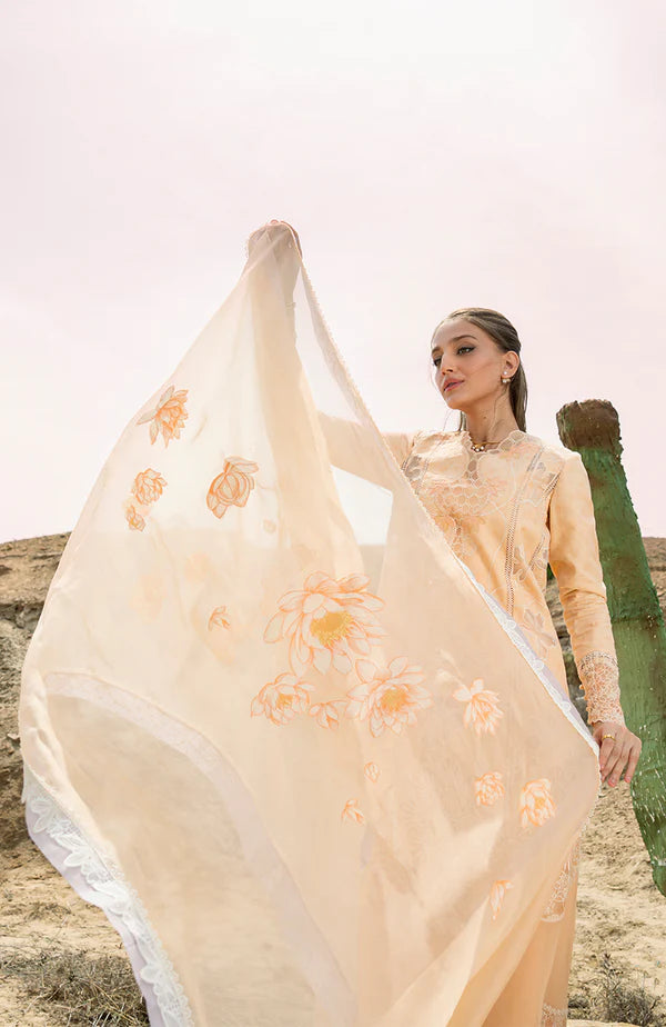 Model wearing peach embroidered dress with matching dupatta from Soraya Noa Summer Casual Pret 2025 Fresco. Pakistani luxury pret UK.