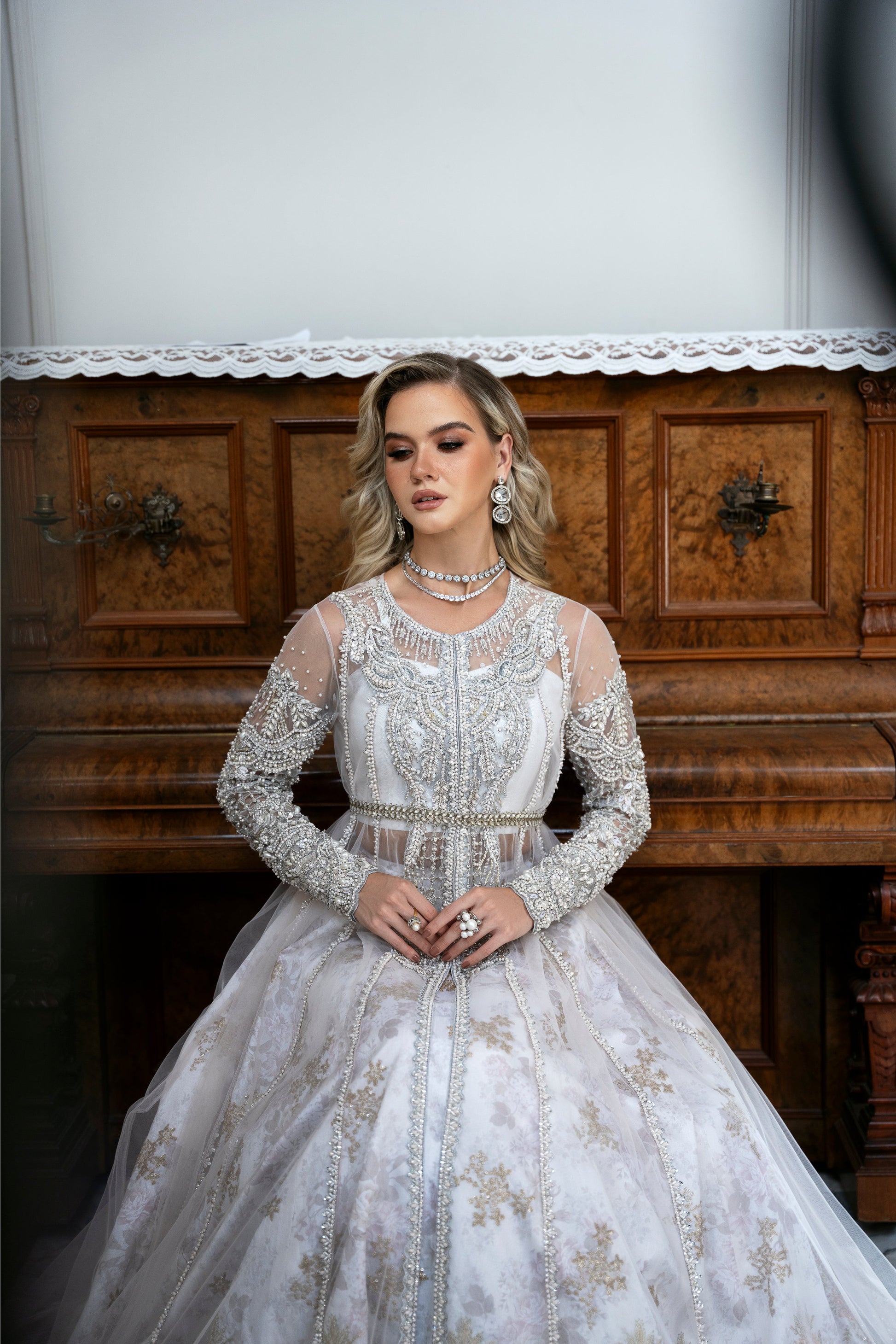 Model wearing Snowdrop from Mysie by Tahira, a stunning white and silver luxury pret outfit, perfect for Pakistani clothes in the UK.