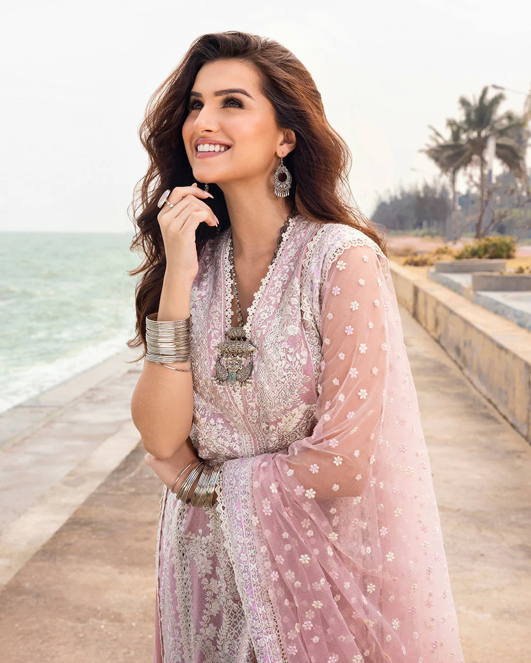Model wearing blush pink Amaryllis dress from Faiza Saqlain Zinnia collection, Pakistani Luxury pret, Faiza Saqlain Pakistani clothes online in UK.