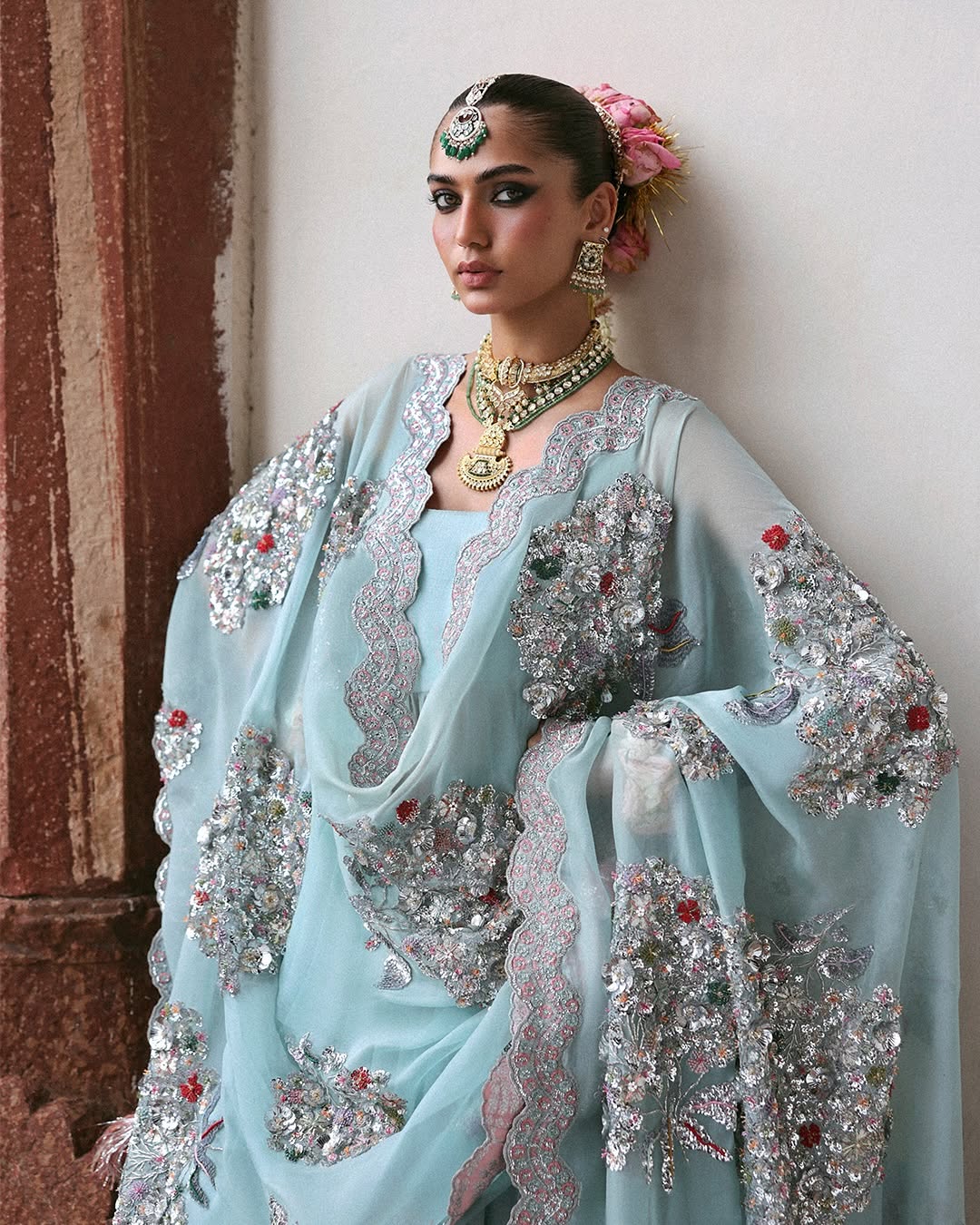 Model wearing Lilia by Hussain Rehar in powder blue with silver embellishments – stunning Pakistani luxury pret outfit in UK.