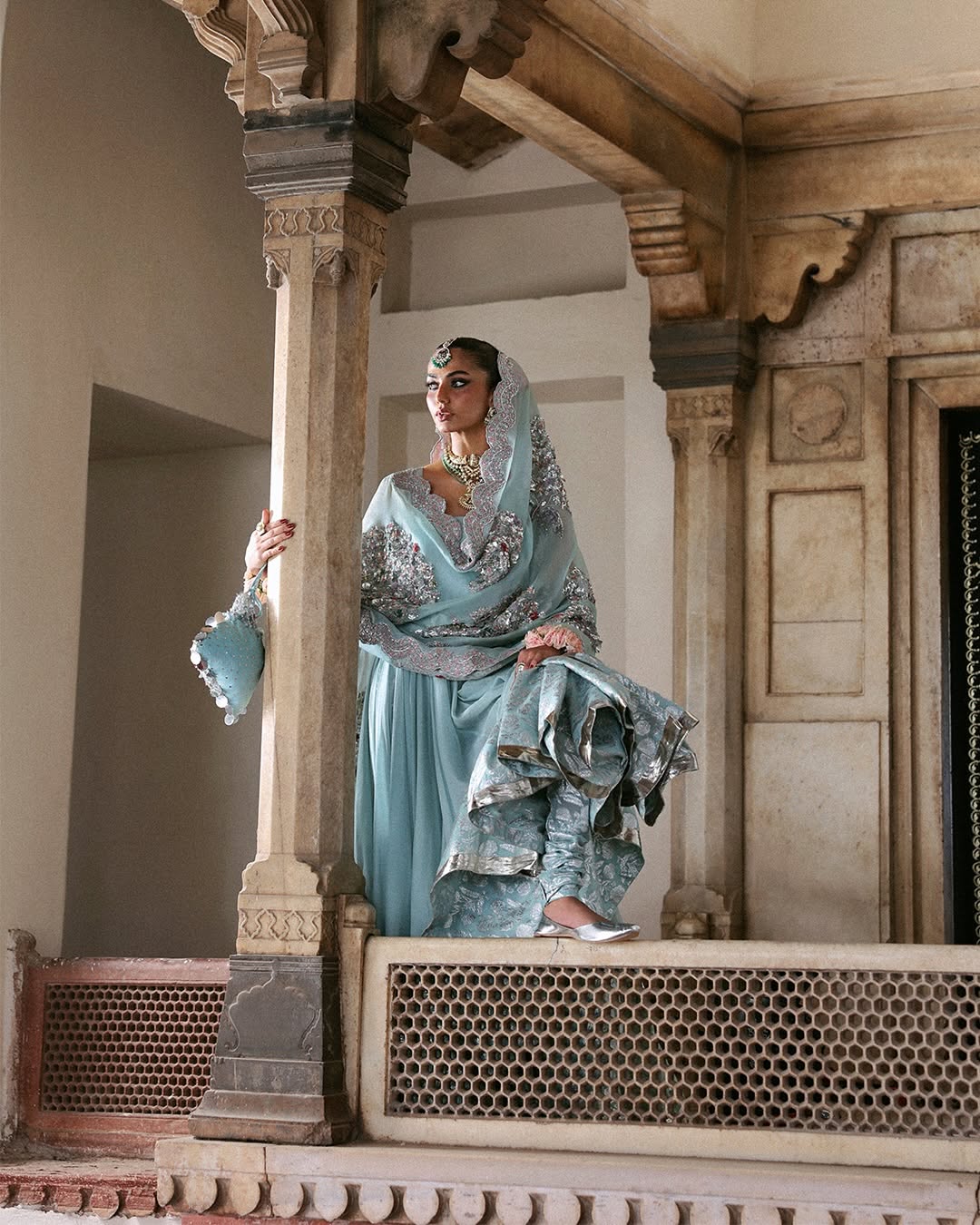 Model wearing Lilia by Hussain Rehar in powder blue with silver embellishments – stunning Pakistani luxury pret outfit in UK.