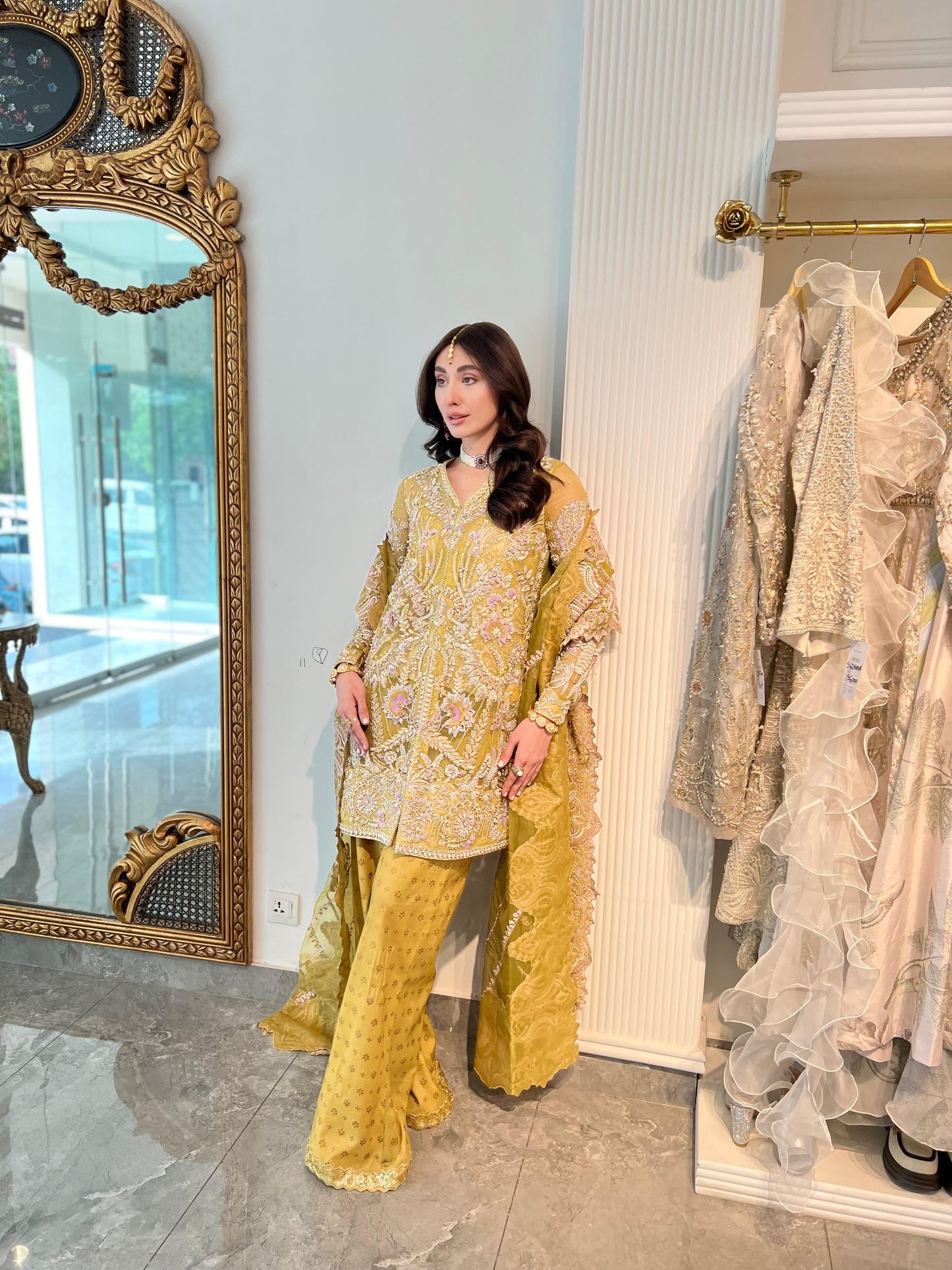 Model wearing Heena from Mysie by Tahira, an intricate yellow embellished ensemble perfect for Pakistani luxury pret in the UK.