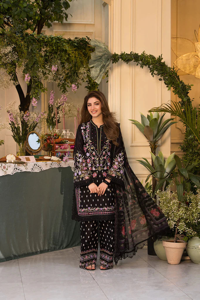 Model wearing Sobia Nazir Vital 2025 Design 5A in black with multicolour floral embroidery. Shop Pakistani luxury pret online in UK.