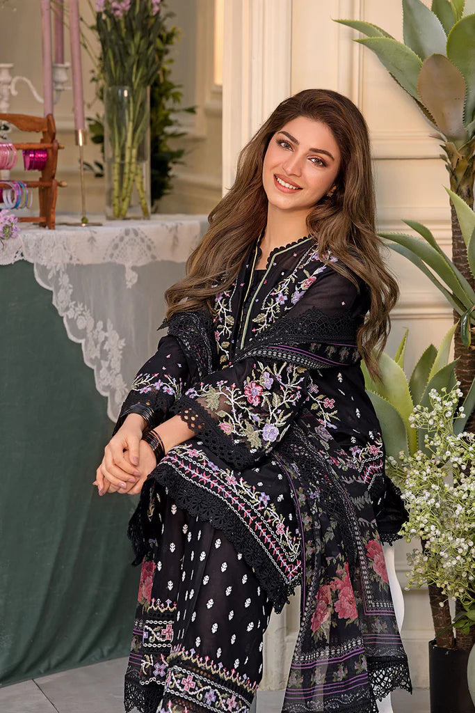 Model wearing Sobia Nazir Vital 2025 Design 5A in black with multicolour floral embroidery. Shop Pakistani luxury pret online in UK.