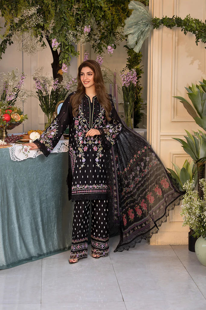Model wearing Sobia Nazir Vital 2025 Design 5A in black with multicolour floral embroidery. Shop Pakistani luxury pret online in UK.