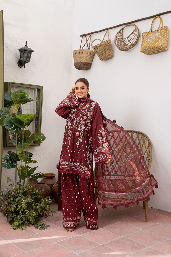 Model wearing deep maroon embroidered dress from Sobia Nazir Vital 2025 Design 5B. Pakistani luxury pret and Pakistani clothes online in UK.