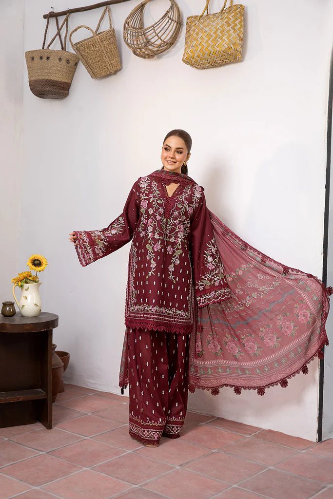 Model wearing deep maroon embroidered dress from Sobia Nazir Vital 2025 Design 5B. Pakistani luxury pret and Pakistani clothes online in UK.