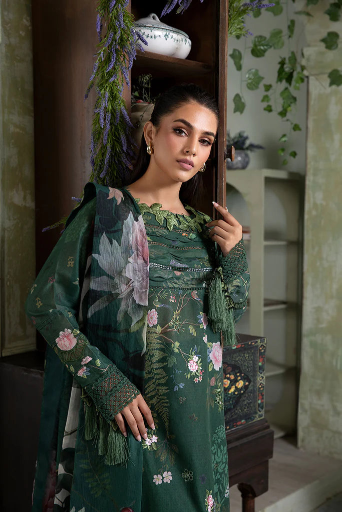 Model wearing dark green Design 5B outfit from Sobia Nazir Vital '25 Vol. 2, Pakistani luxury pret and Pakistani clothes online in UK.