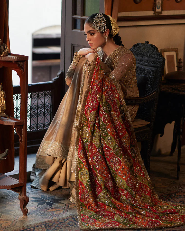 Model wearing beige and multicolor dress Sulata by Faiza Saqlain, Pakistani luxury pret, available online in UK