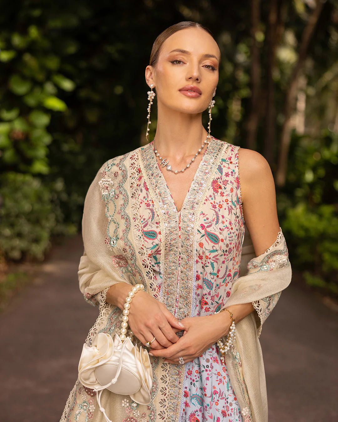Model wearing multicolored Danica dress with mint trousers from Faiza Saqlain Zinnia collection, Pakistani Luxury pret, Pakistani clothes online in UK.