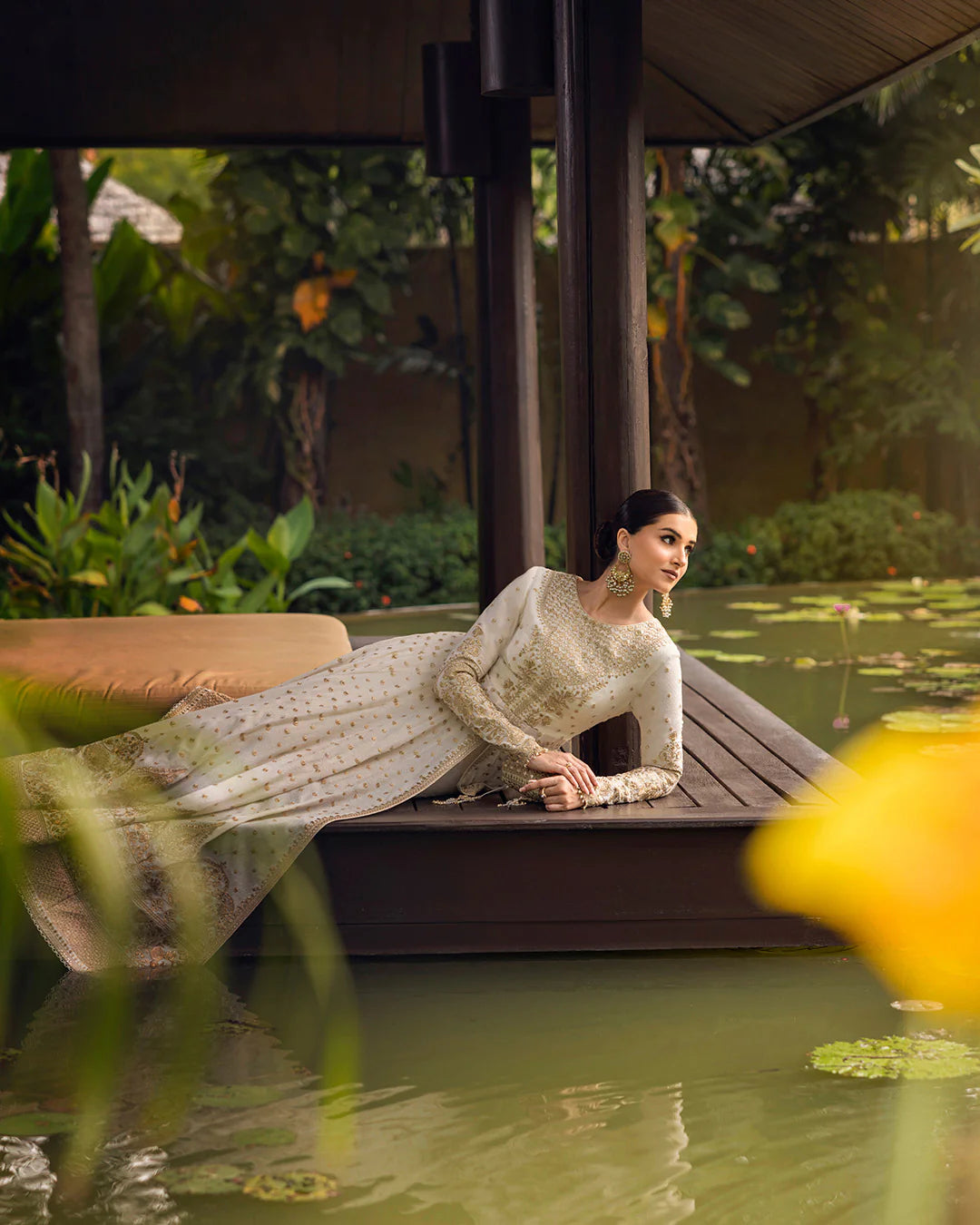 Model wearing ivory gold Lily dress from Faiza Saqlain Zinnia collection, Pakistani Luxury pret, Faiza Saqlain Pakistani clothes online in UK.