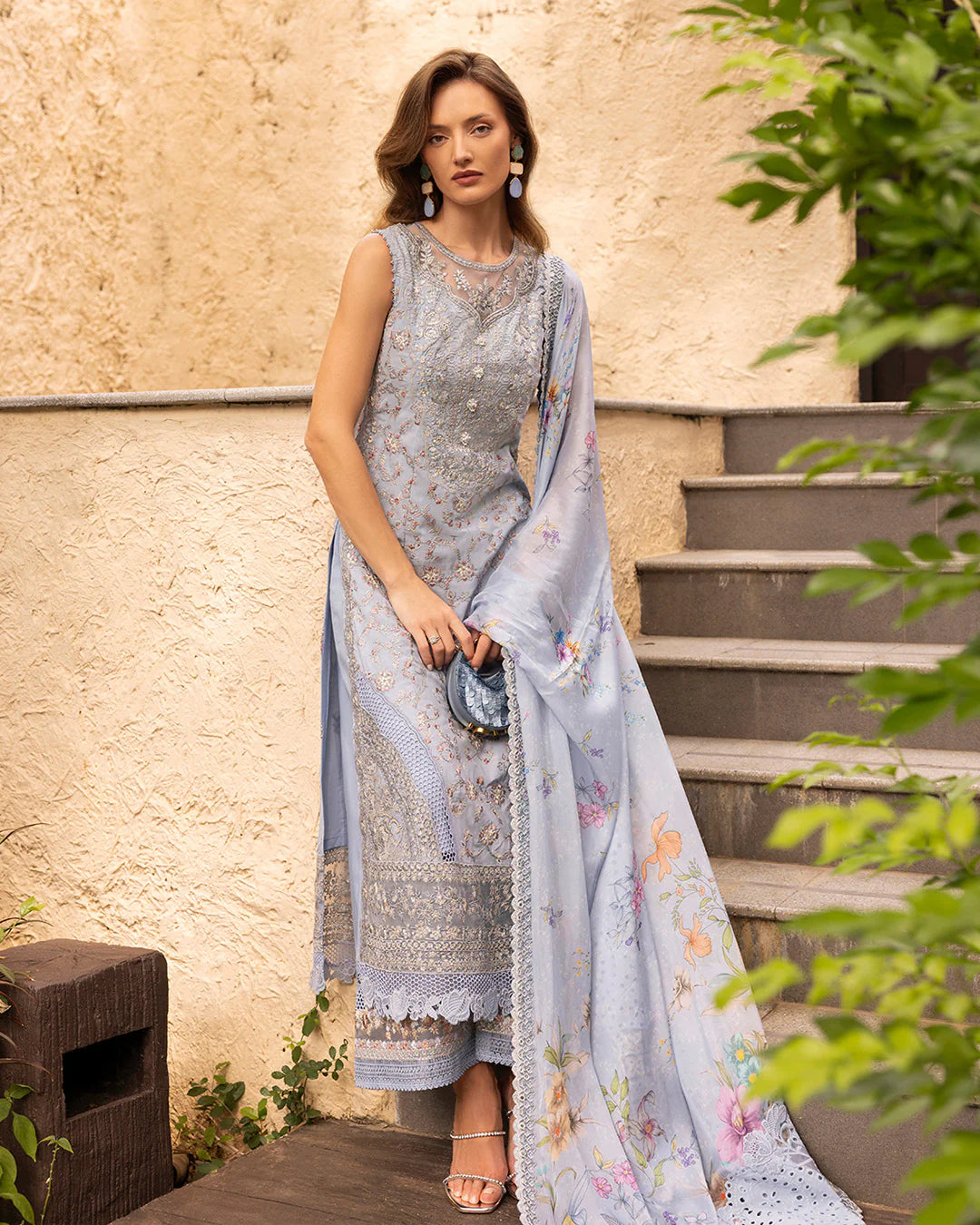 Model wearing pastel blue Liana dress from Faiza Saqlain Zinnia collection, Pakistani Luxury pret, Faiza Saqlain Pakistani clothes online in UK.