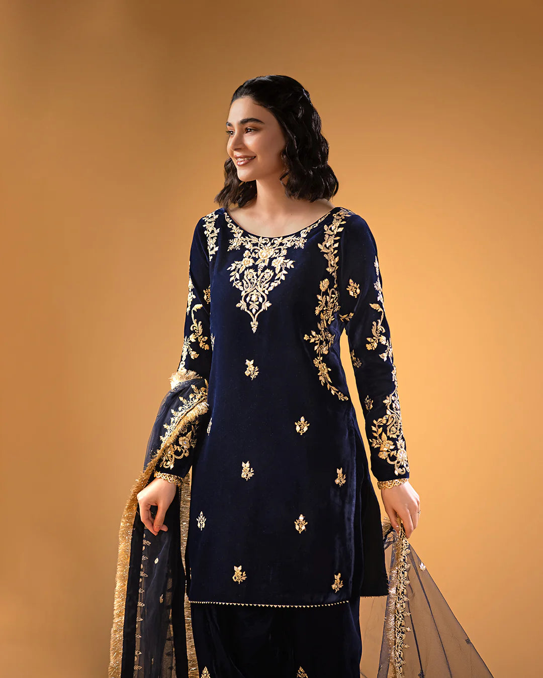 Model in Faiza Saqlain UK Sayonee attire, exquisite Pakistani clothes UK from the Makhmal collection.