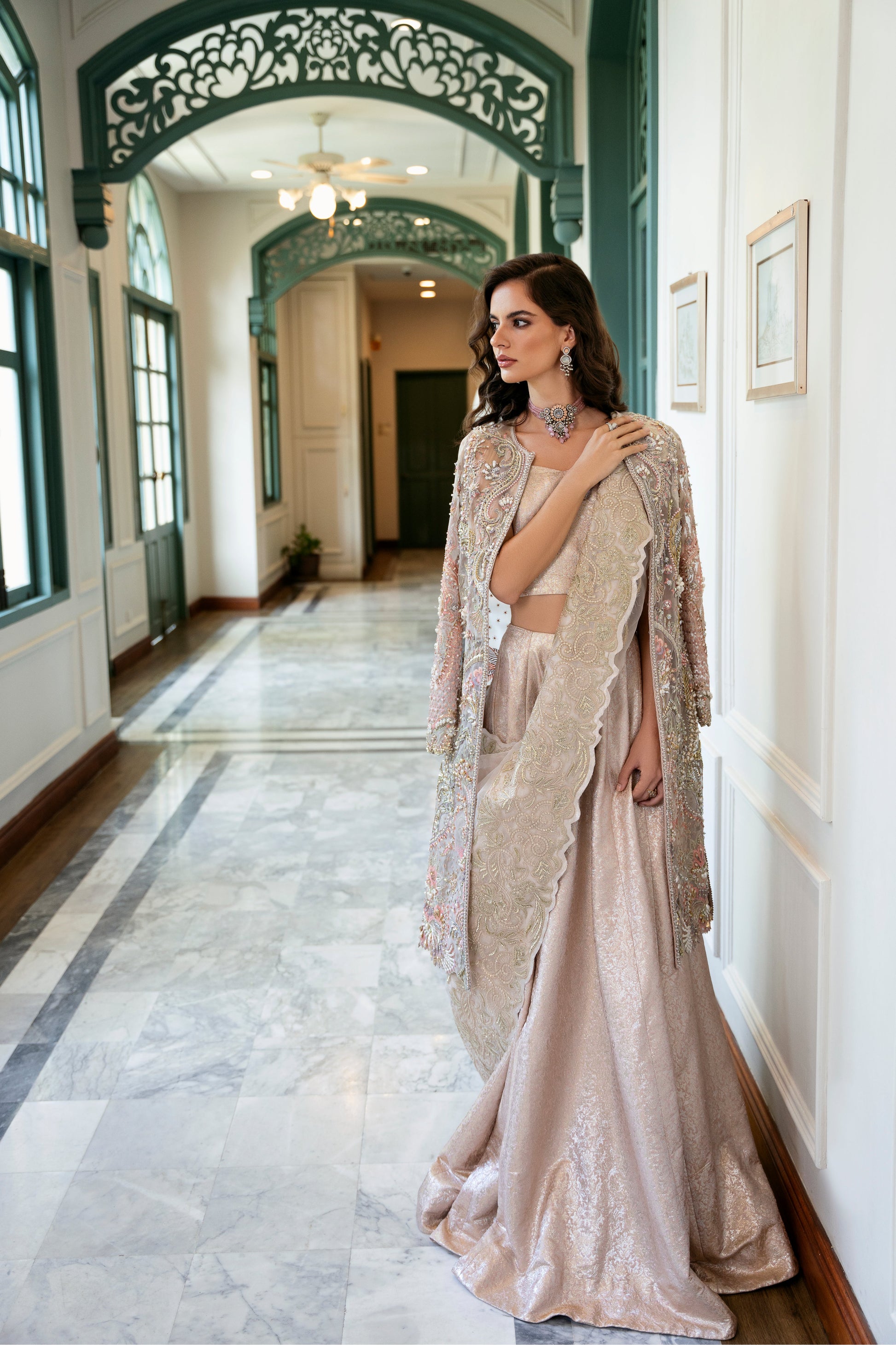 Model wearing Arsh from Mysie by Tahira, a stunning beige luxury pret outfit with intricate embroidery, perfect for Pakistani clothes in the UK.