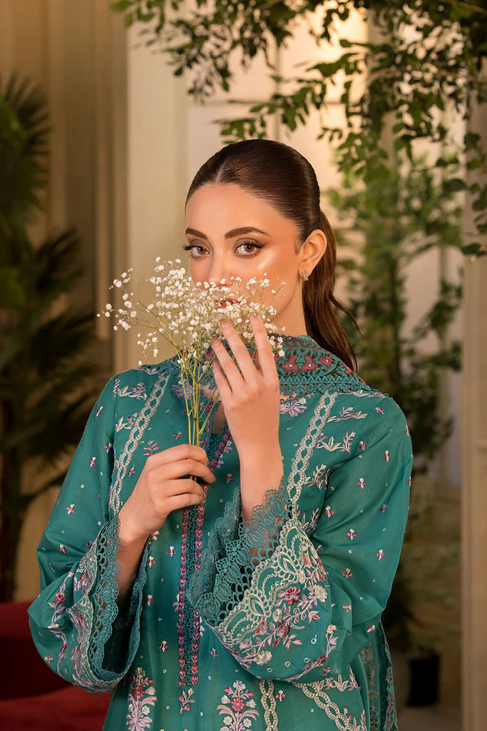 Model wearing Sobia Nazir Vital 2025 Design 6A in teal with intricate embroidery. Shop Pakistani luxury pret by Sobia Nazir online in UK.