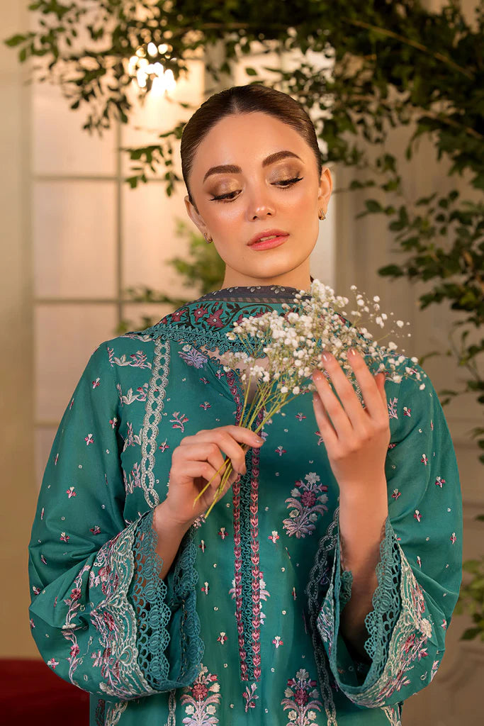 Model wearing Sobia Nazir Vital 2025 Design 6A in teal with intricate embroidery. Shop Pakistani luxury pret by Sobia Nazir online in UK.