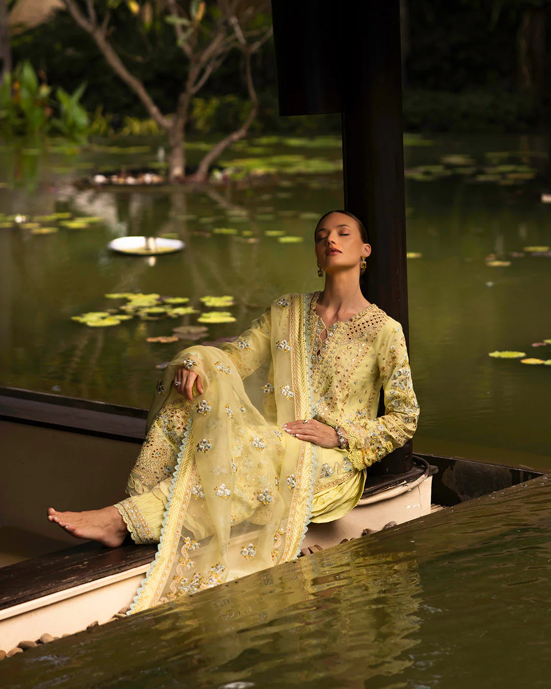 Model wearing pastel yellow Azalea dress from Faiza Saqlain Zinnia collection, Pakistani Luxury pret, Faiza Saqlain Pakistani clothes online in UK.