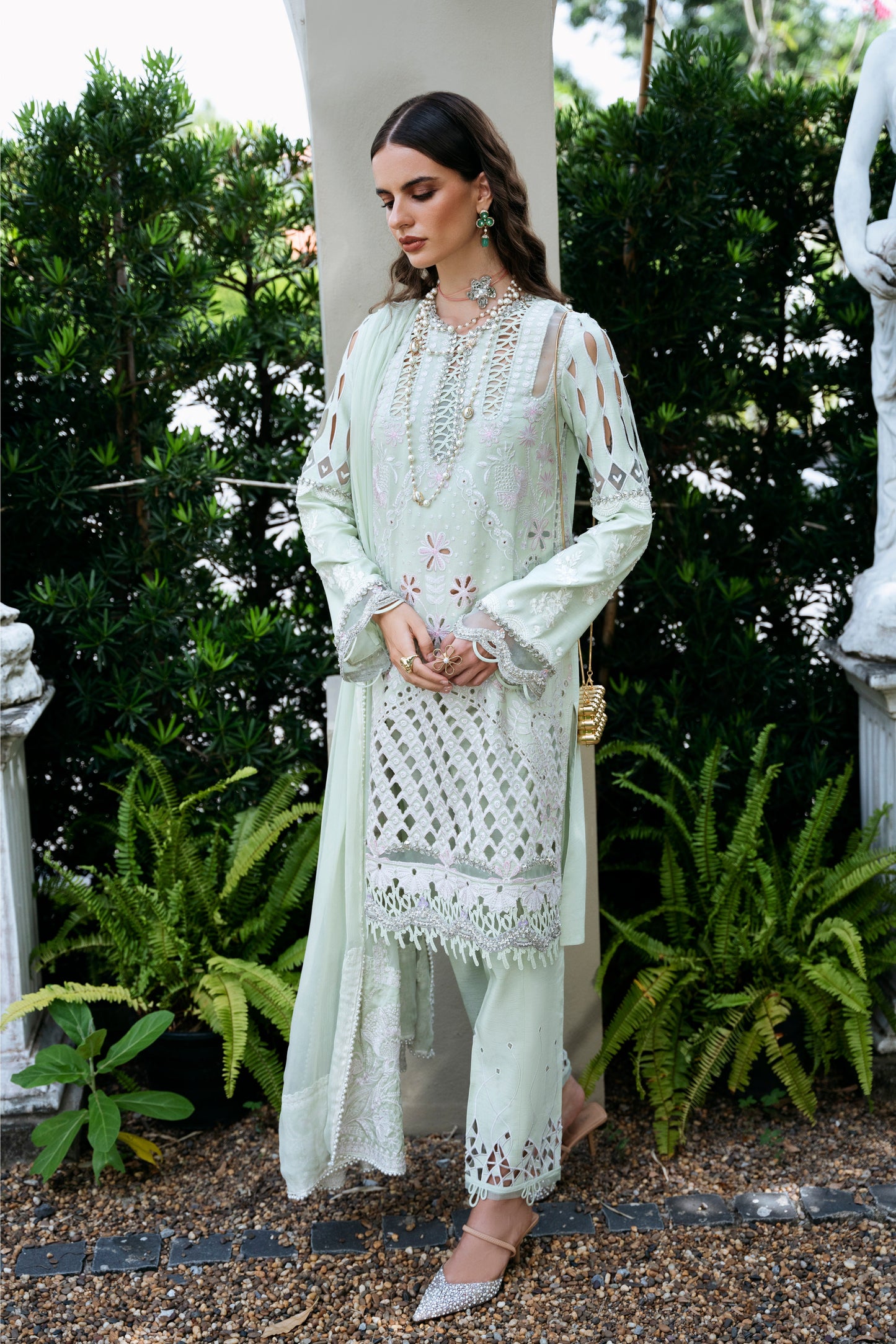 Model wearing Rosina from Mysie by Tahira in soft mint green, perfect for Pakistani luxury pret in UK.