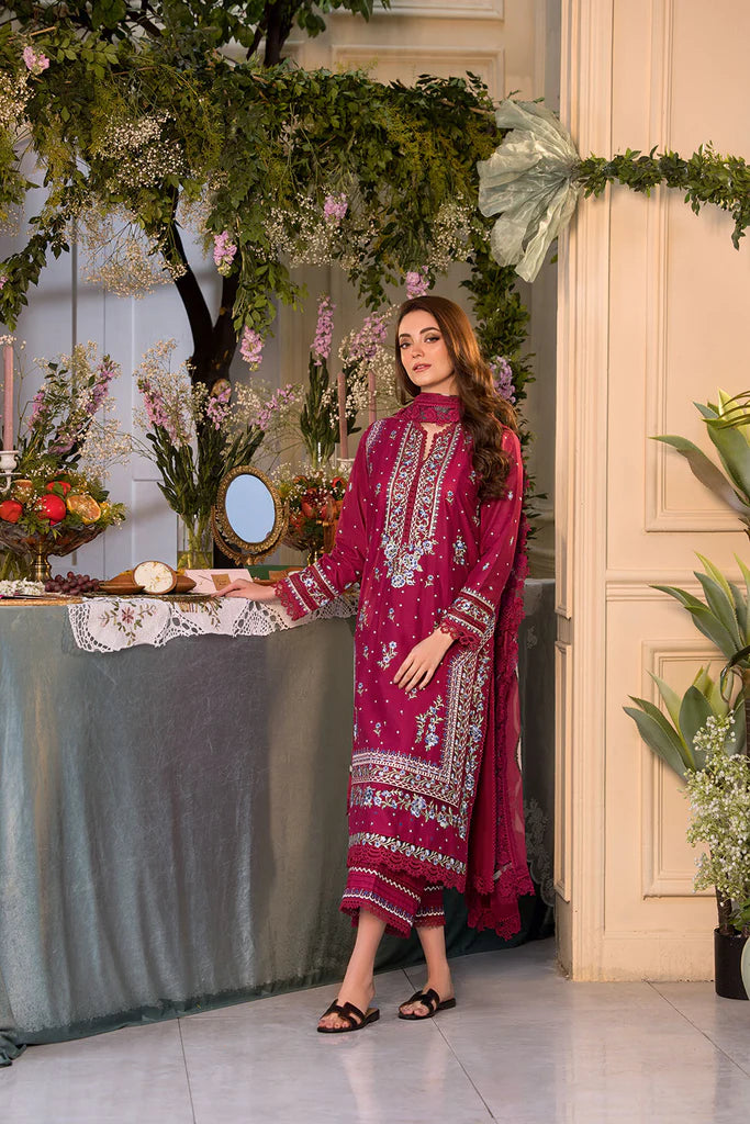Model wearing maroon embroidered dress from Sobia Nazir Vital 2025 Design 7B. Pakistani luxury pret and Pakistani clothes online in UK.