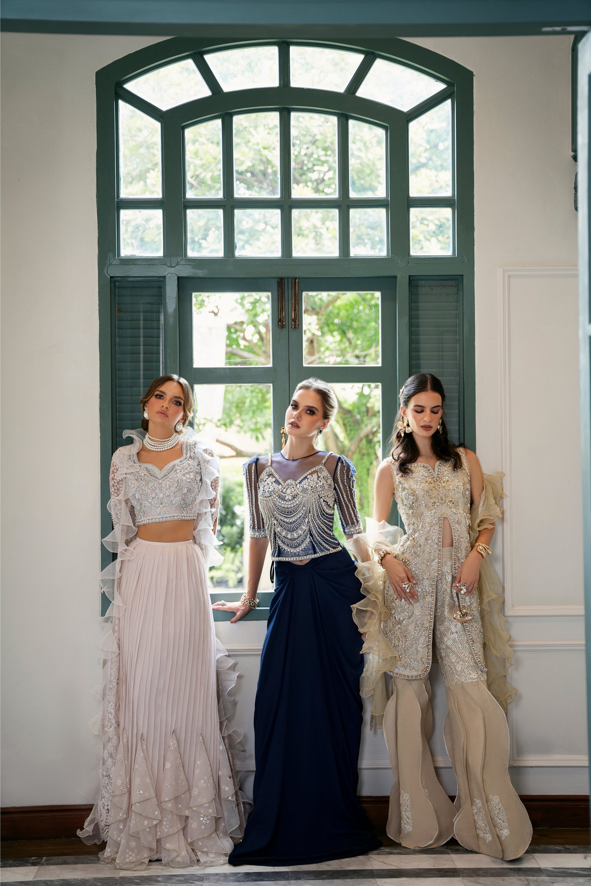 Model wearing Bluebell from Mysie by Tahira, a luxurious navy blue outfit with intricate beaded details, perfect for Pakistani luxury pret in the UK.