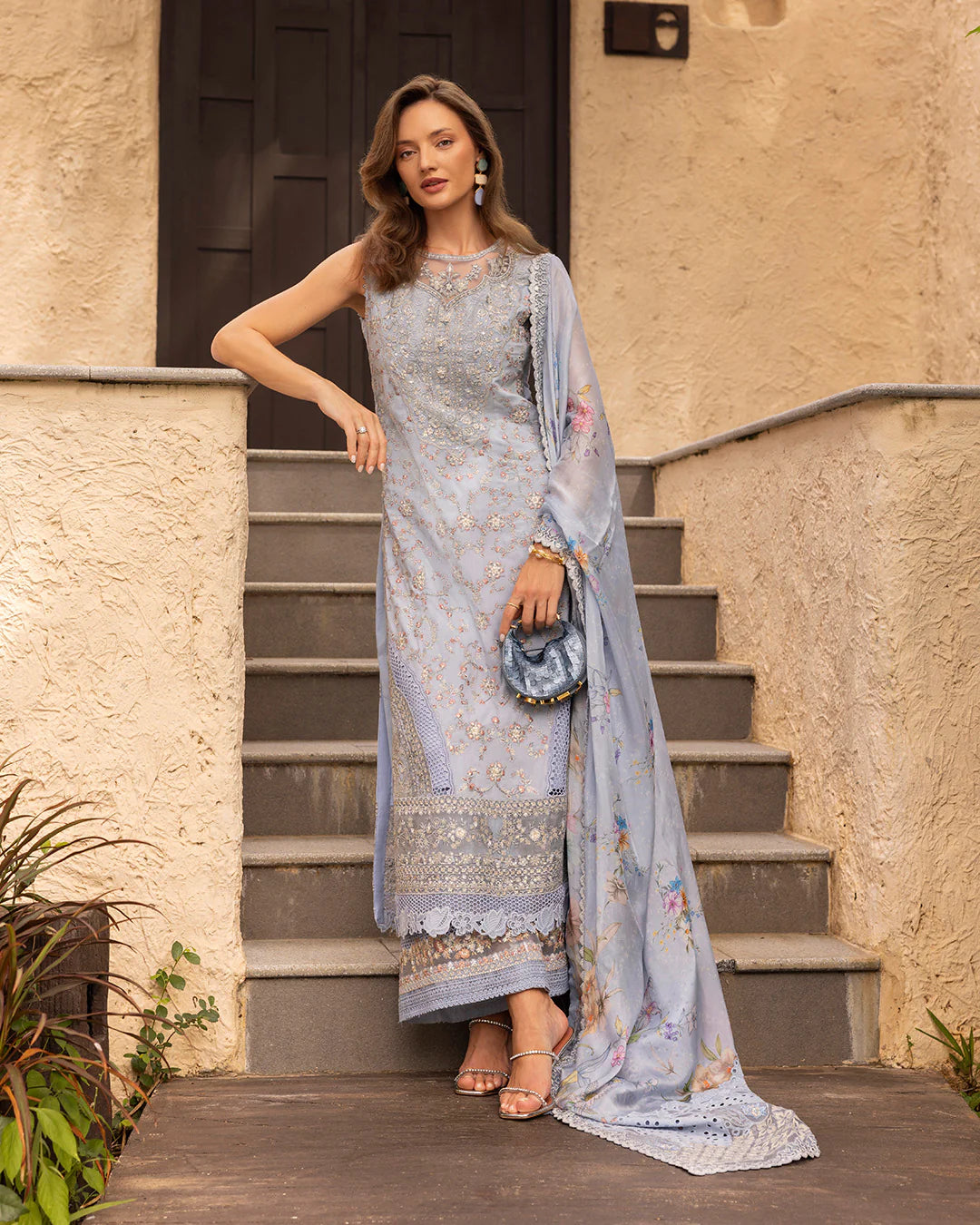 Model wearing pastel blue Liana dress from Faiza Saqlain Zinnia collection, Pakistani Luxury pret, Faiza Saqlain Pakistani clothes online in UK.
