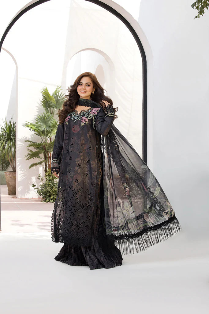 Model wearing Sobia Nazir Vital 2025 Design 8A in black with floral embroidery. Shop Pakistani luxury pret by Sobia Nazir online in UK.