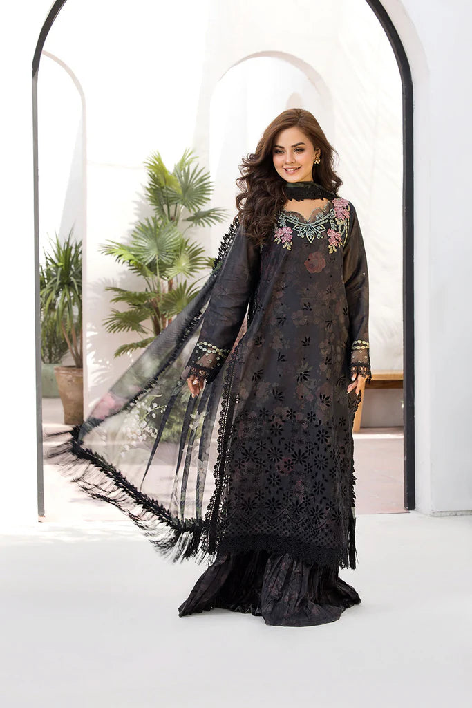 Model wearing Sobia Nazir Vital 2025 Design 8A in black with floral embroidery. Shop Pakistani luxury pret by Sobia Nazir online in UK.
