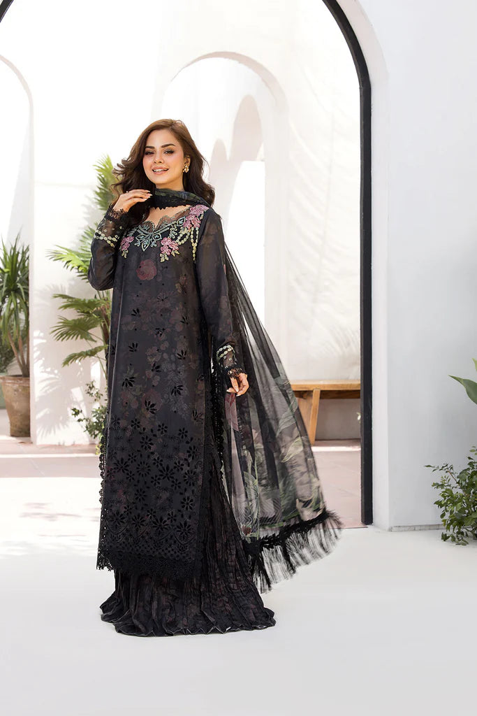 Model wearing Sobia Nazir Vital 2025 Design 8A in black with floral embroidery. Shop Pakistani luxury pret by Sobia Nazir online in UK.
