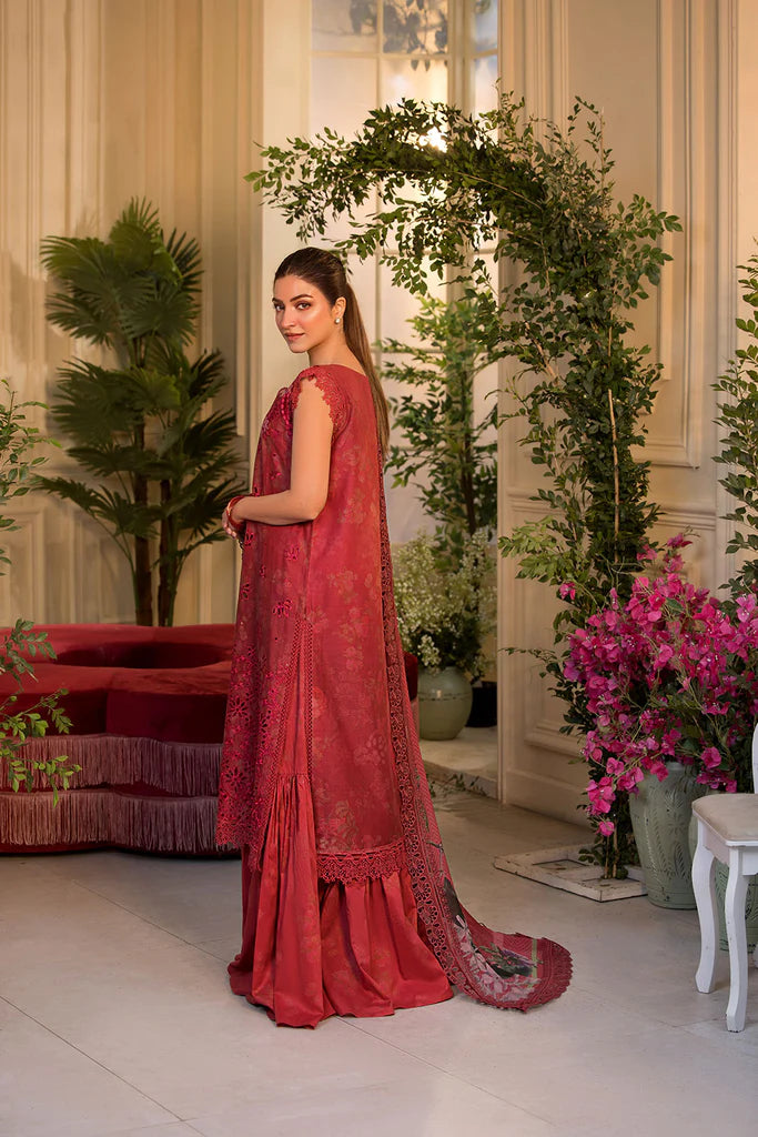 Model wearing Sobia Nazir Vital 2025 Design 8B in red with laser-cut detailing and embroidered dupatta. Shop Pakistani clothes online in UK and explore premium Pakistani luxury pret.